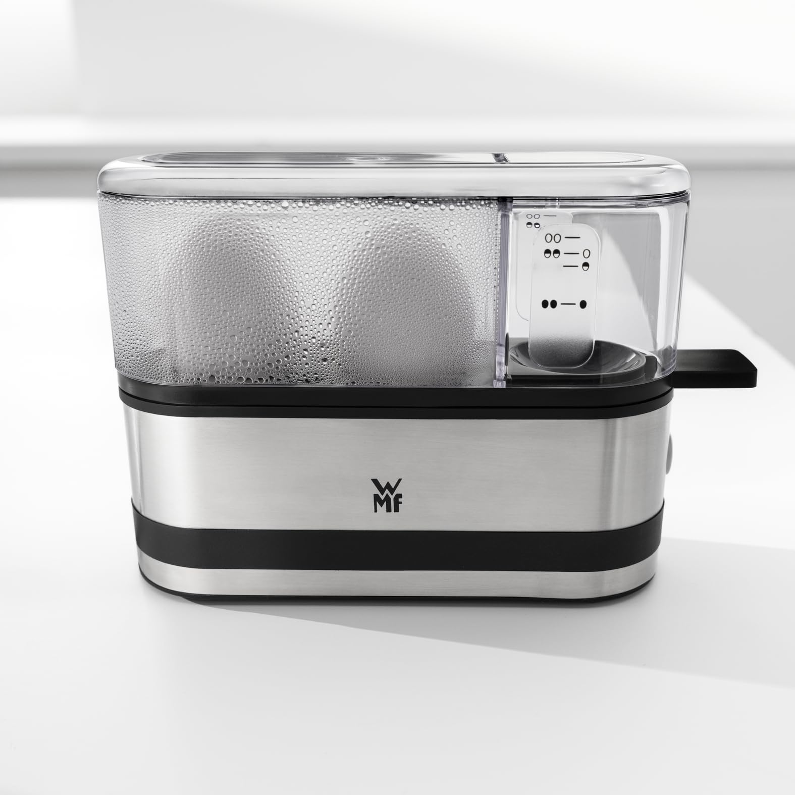 wmf-k-chenminis-eierkocher-f-r-1-2-eier-cromargan-edelstahl-matt-250-w-mit-messb image 3